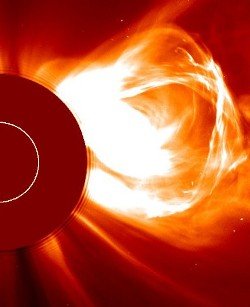A still image of a coronal mass ejection, apparently showing lines of material that appear to move away from the Sun only to later fall back onto the Sun.
